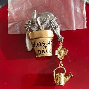 Nursing It Back Gold and Silver Brooch